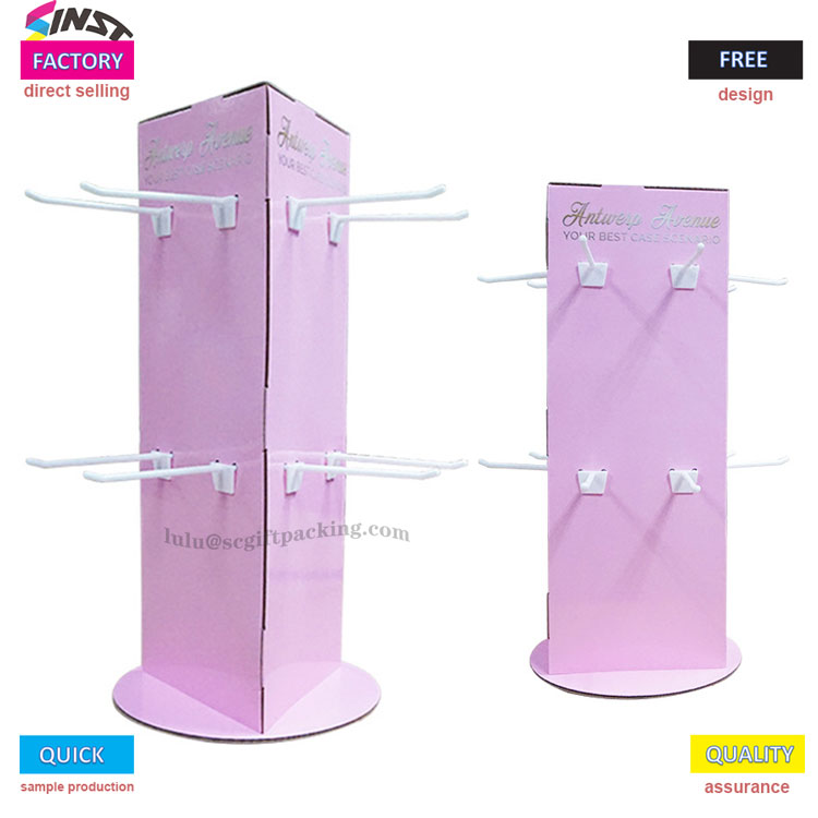 Stolný stojan s háčikom na lyžičke zobrazuje malé predmety „univerzálny vzorec“